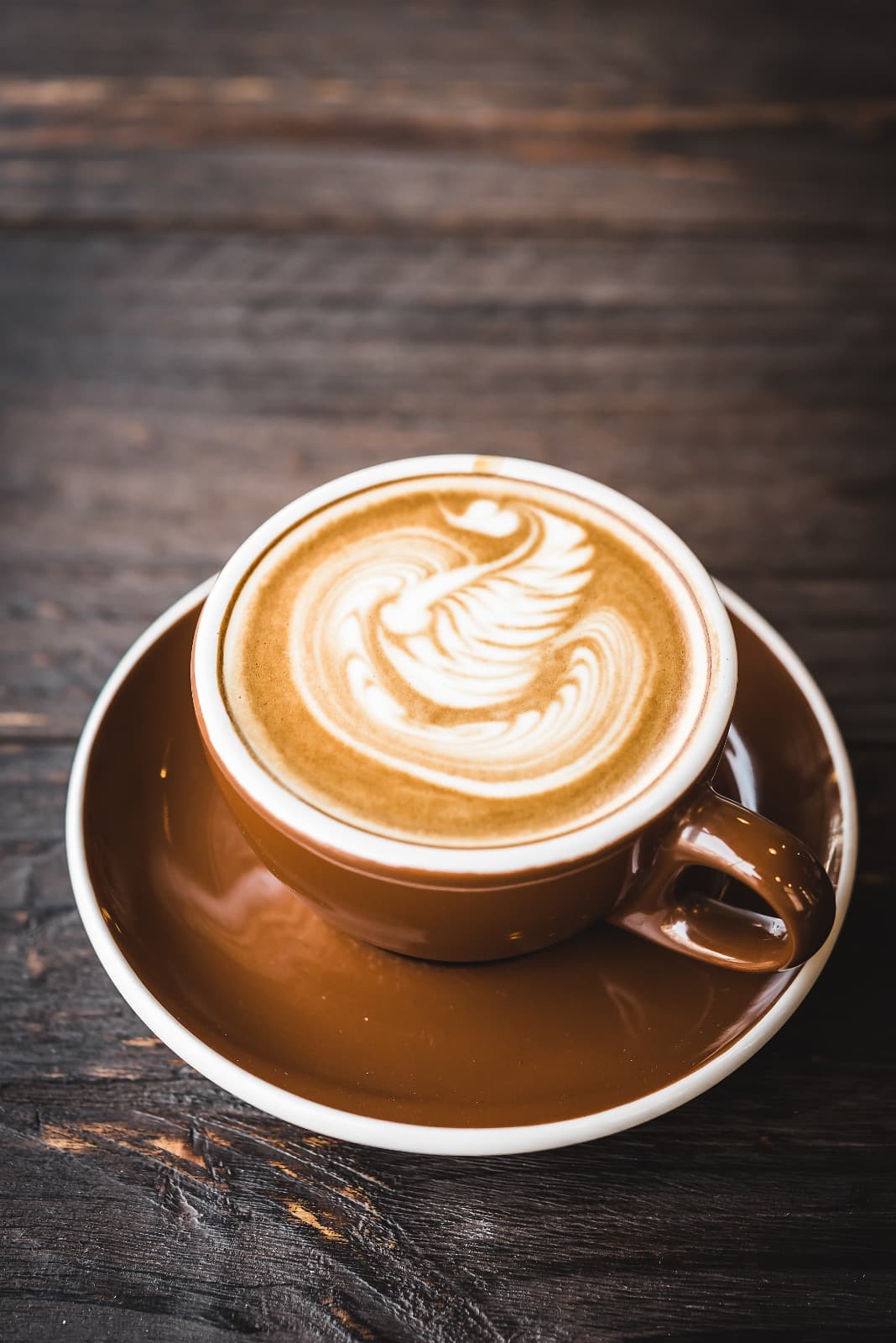 Latte art in white ceramic cup