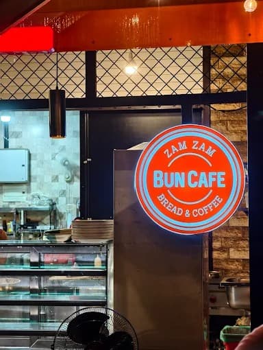 Bun Cafe interior — warm lighting and cozy seating